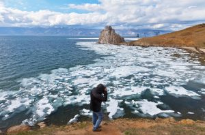 Climate changes rises temperatures which melts ice caps and causes surface flooding