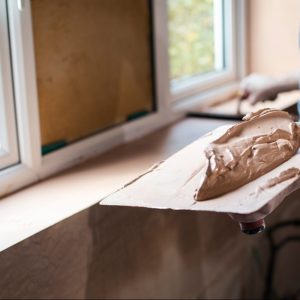 Mixed plaster at a job