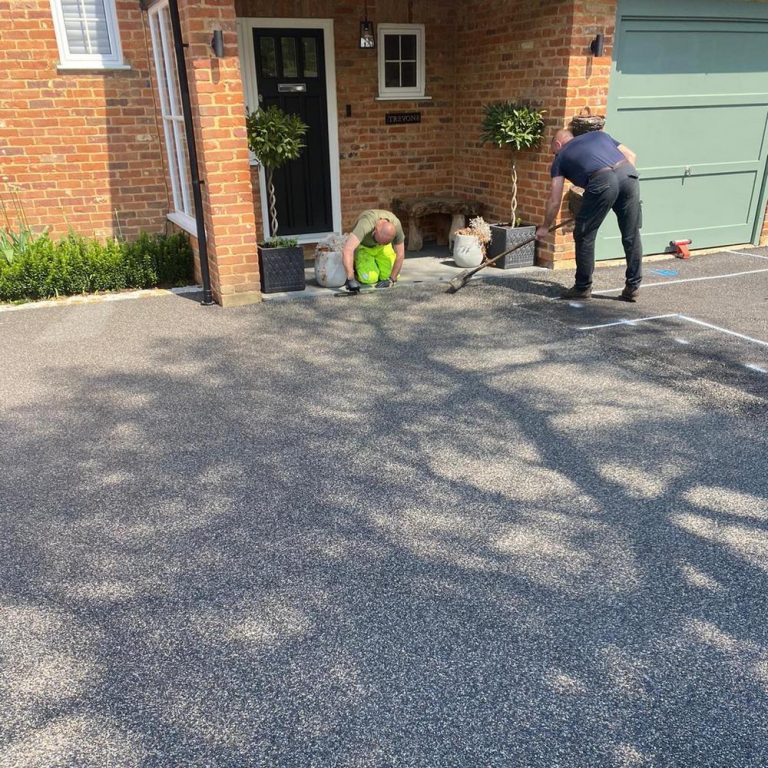 Ocean Grey Resin Bound Gravel Driveway - Material Being Trowelled