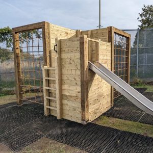 Rubber Grass Mats Installed Under School Climbing Frame