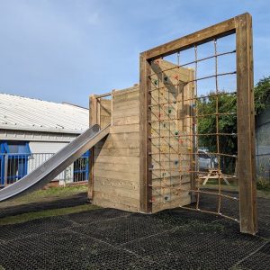 Rubber Grass Mats Under Climbing Frame With Slide