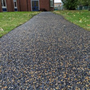 Gold/Black Soft Gravel Pathway Installation - Close Up