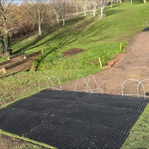 Rubber Grass Mats Installed To Protect New Turf