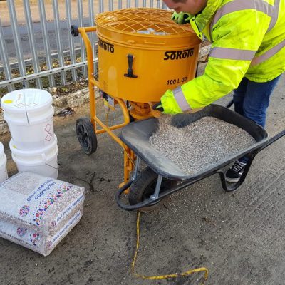 SoRoTo forced action mixer in use with wheelbarrow