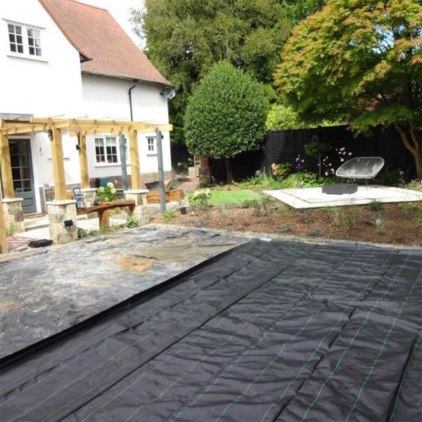 Landscape membrane installed under resin bound gravel